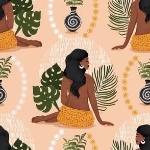 African American black girl sitting with jungle leaves