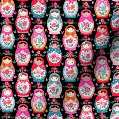 Floral nesting dolls on black ditsy scale