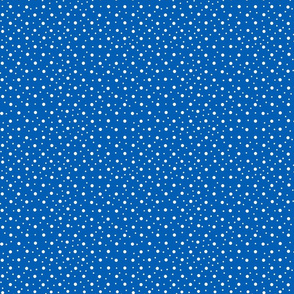White polka dots on blue