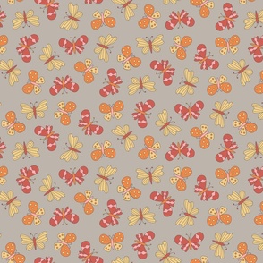 Red, pink, yellow, and orange butterflies, gray background