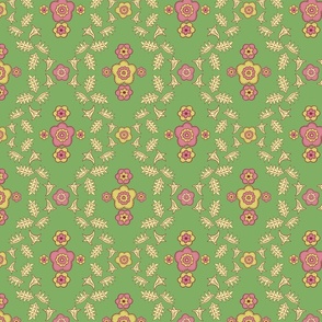 Damask, pink and yellow abstract flowers & leaves on a green background