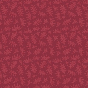 Pink abstract leaves tossed on a cranberry red background