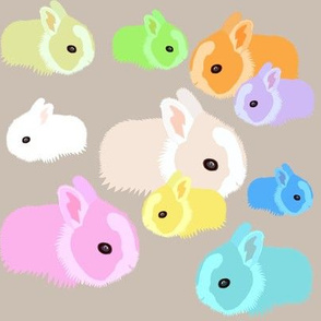 Coloured bunnies fawn background