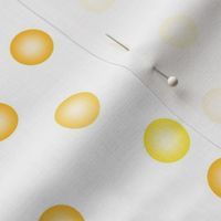 balloon dots in yellow, saffron and gold on white