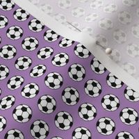 Micro soccer balls on purple