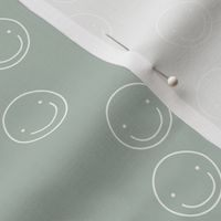 Smiley faces positive vibes little smile circular boho design neutral earthy tones nursery design moody mint green 