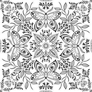 white and black floral butterfly mandala