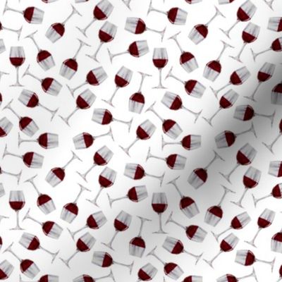Red wine glasses on white background 