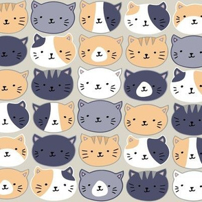 cute cat faces on tan