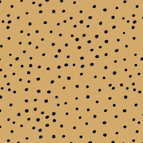 The tiny polka dots hand drawn spots minimalist boho print nursery ochre yellow turmeric black 
