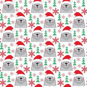 small santa otters with snowflakes and trees