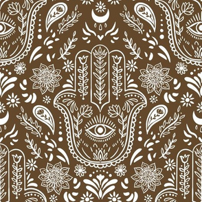 Hamsa outlines on dark brown