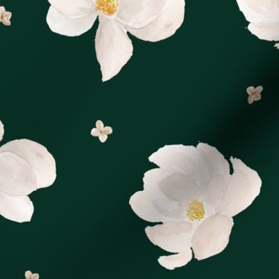 magnolia flowers on monstera green