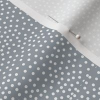 Tiny little spots in abstract waves scales shape dots texture neutral nursery soft gray stone blue waters