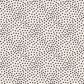 Tiny little spots in abstract waves scales shape dots texture neutral nursery soft ivory cream black