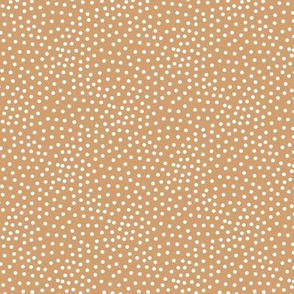 Tiny little spots in abstract waves scales shape dots texture neutral nursery cinnamon camel yellow