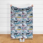 Large jumbo scale // Happy dogs catching waves // pastel blue background darker blue waves brown white and blue doggies yellow red and turquoise surf and bodyboards