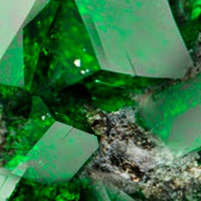 Inserting green crystals into stone