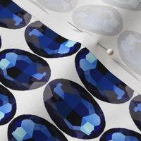 All that Glitters is Blue Gemstone on White 