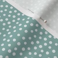 Spotty - light teal dots over teal