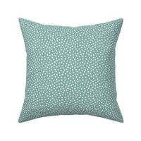 Spotty - light teal dots over teal