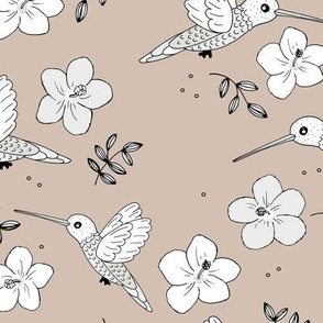 Hummingbirds and hibiscus flowers boho Hawaii inspired aloha nursery design soft latte beige sand