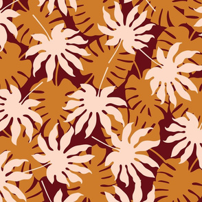 Monstera tropical leaves in copper, ochre and beige