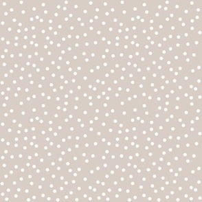 dots white on sand