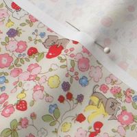 cream cat fabric with colorful flowers