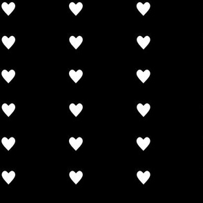 Line of white hearts on black backgound