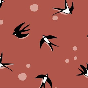 Swallow birds flying in red rust, dots