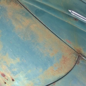 Patina on old car closeup with kaleidoscope repeat mustard blue chrome [colors]