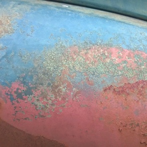 Patina on old car closeup with kaleidoscope repeat blue pink red 
