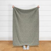 The distorted leopard boho animal print green gray 