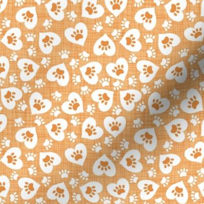 heart paws on orange linen texture