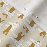 Small Simple Flyball dogs silhouettes - tan