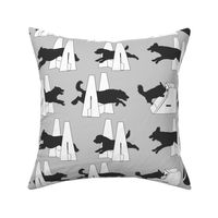 Simple Flyball dogs silhouettes - gray