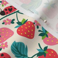 Garden strawberries and ladybirds