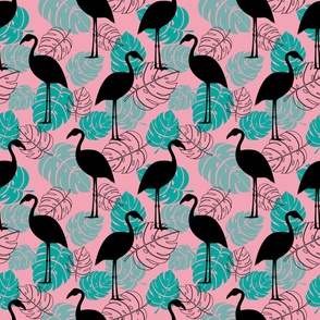 Flamingo silhouettes and tropical leaves on pink background
