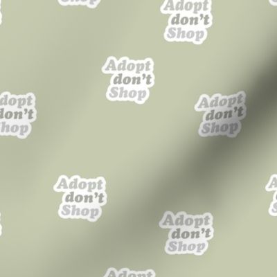 Adopt don't shop - animal shelter and pet adoption saying text design retro seventies style soft sage green