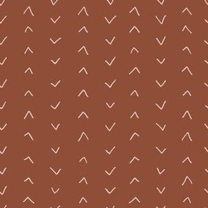 minimalist mud cloth arrows - rust