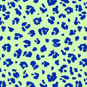Neon panther pop art retro style animal print leopard skin design in lime green yellow eclectic blue