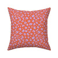 Neon panther pop art retro style animal print leopard skin design in bright orange lilac purple