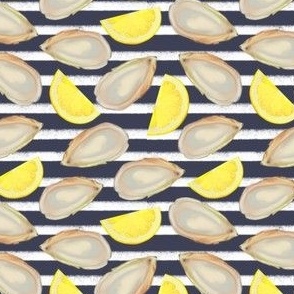 oysters and lemon slices on navy and white stripes 