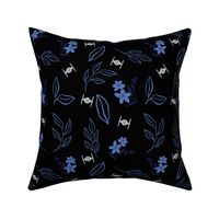 Blue flowers on black with spaceship.