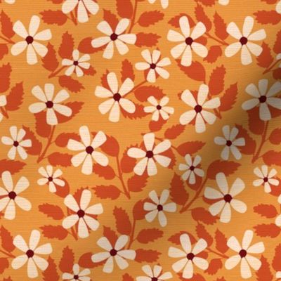 Daisies on orange with woven texture