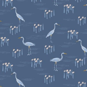 Small Wetland Birds Great Herons in water on blue gray