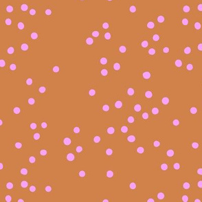 The minimalist neon confetti spots and dots colorful pop art style design burnt orange pink
