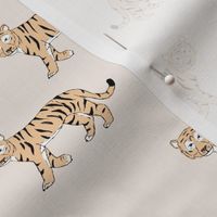 Little curious tiger wild animals boho design for kids nursery in soft blush ivory beige orange
