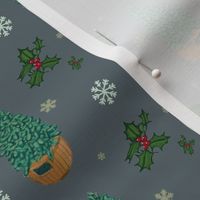 Fir tree with snowflakes and holly, Christmas fabric on grey
